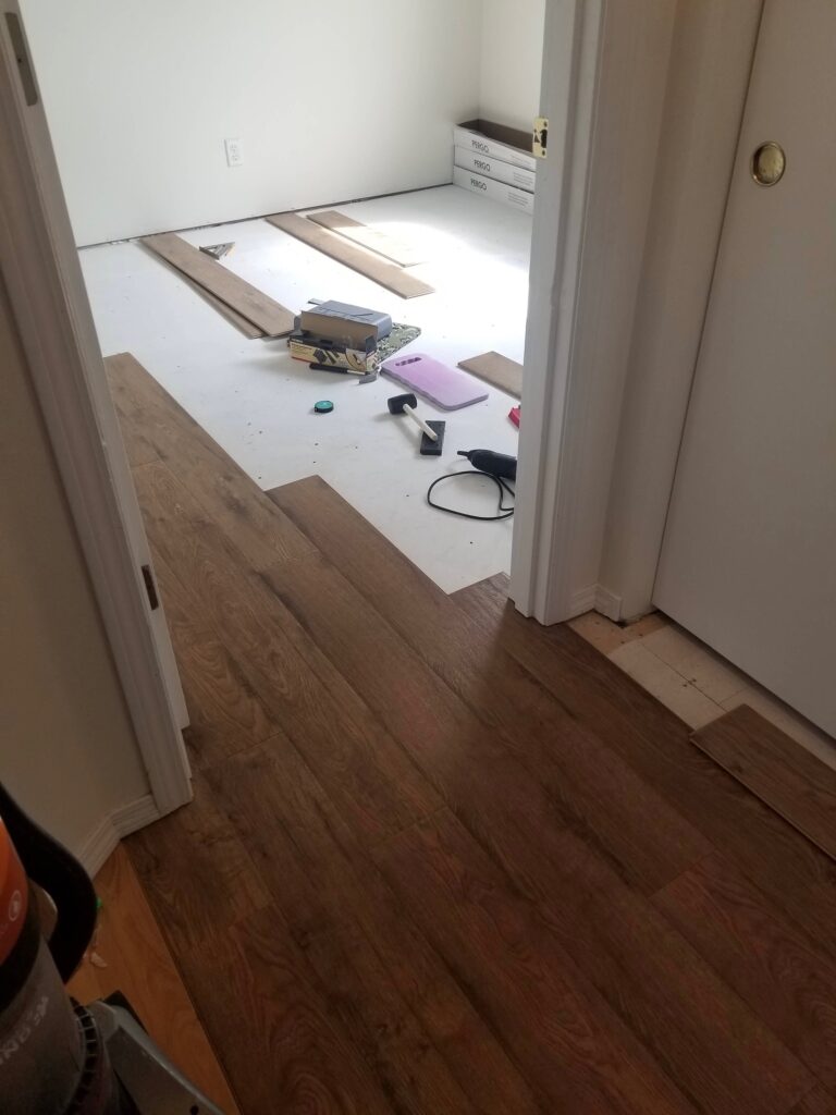 laminate installation through door threshold with no seems at door frame