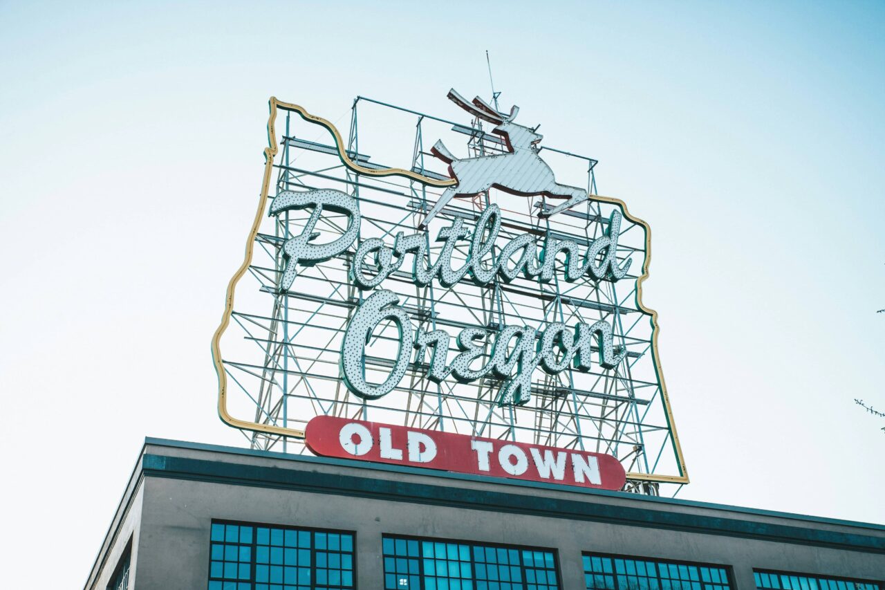 Iconic Portland Oregon Old Town sign for Meeting the Team Behind Medium by Sue Evergreen.