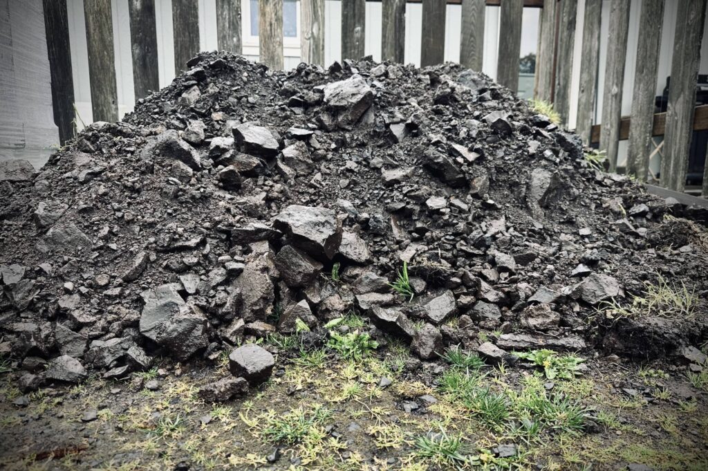 A giant pile of rocks that was dug out of Sue Evergreen's yard in a post about removing rocks for mindfulness.